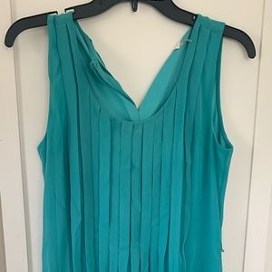 Teal Calvin Klein mini dress with gold belt
